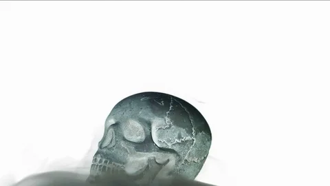 Invert vision of Human skull in loop rotation with black smoke Stock Footage 70804514