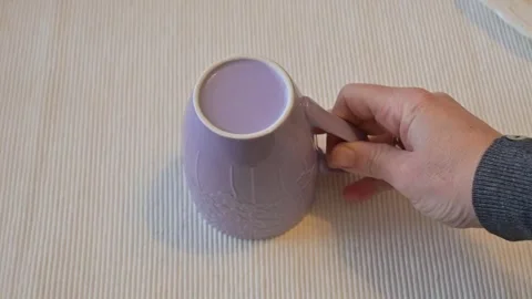 Inverted Empty Mug on Table, Minimal Lifestyle Concep Stock Footage 336898017