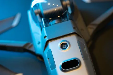 An inverted Mavic 2 Pro quadcopter on a black background in blue light. Infrared Stock Photos