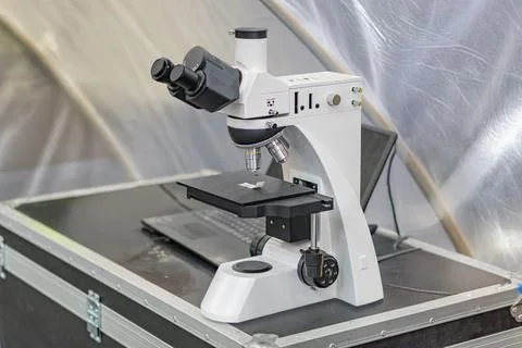 Inverted microscope in a biological research lab, mounted on stand with vis.. Stock Photos