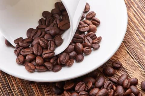 Inverted white cup with coffee Foto stock
