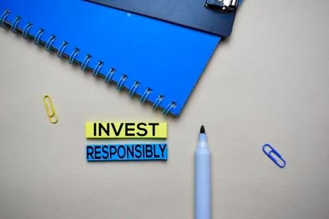 Invest Responsibly text on sticky notes with office desk. Stock Market Exchan イラスト素材