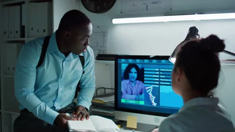 Investigator and Forensic Scientist Using Criminal Database on Computer in Lab 스톡 동영상 285821123