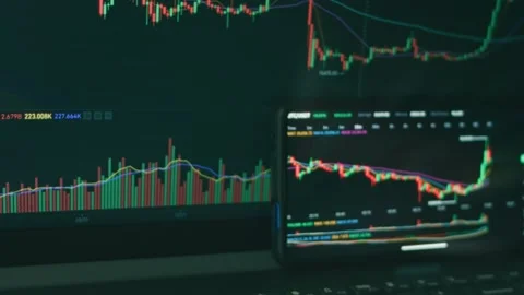 Investor analyzing financial data crypto stock market, coin price on smart phone Stock Footage 249934672