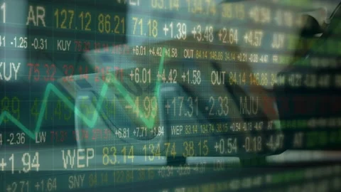 Investor Using Device with Green Upward Stock Market Graph Stock Footage 336757562
