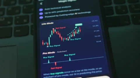 Investor using smart phone analyzing financial data crypto stock market, coin Stock Footage 249938191