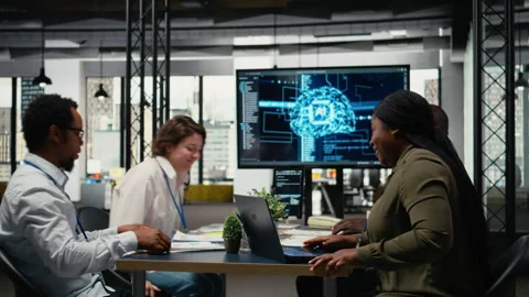 Investors meeting with software developers in startup office Stock Footage 322704334