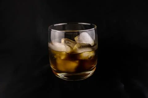 An invigorating drink with ice cubes Stock Photos