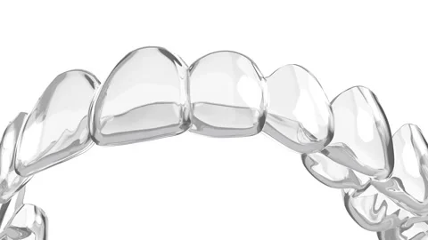 Invisalign removable aligner over white background Stock Footage 139616488
