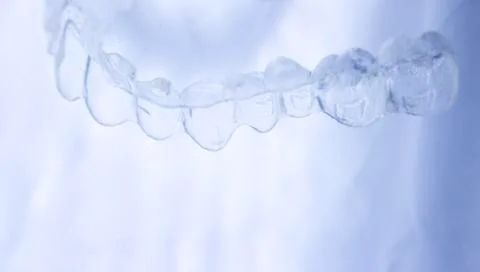 Invisible aligner teeth retainer Stock Photos