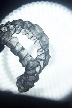 Invisible teeth aligner bracket Stock Photos