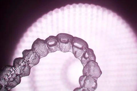 Invisible teeth aligner bracket Stock Photos
