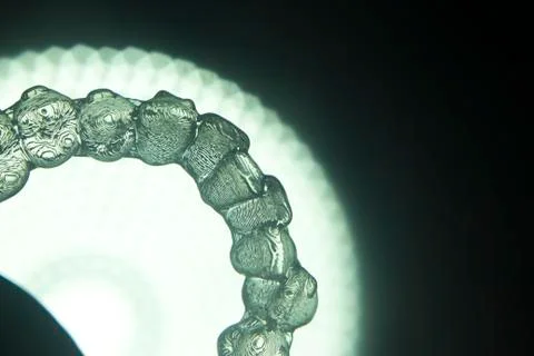 Invisible teeth aligner bracket Stock Photos