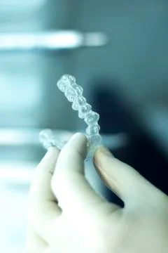 Invisible teeth aligners brackets Foto stock