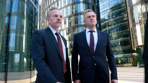 Invitation to business team looking at camera three business partners do Stock Footage 134622243