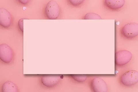 Invitation mockup on chocolate easter eggs Stock Photos