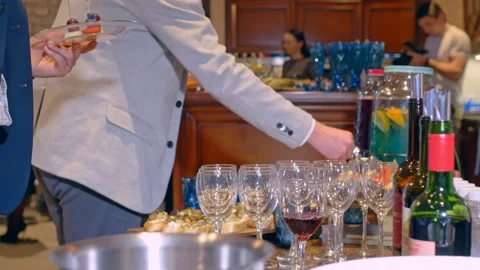 The invited guests of the buffet table are free to treat themselves from the Stock Footage 153643773