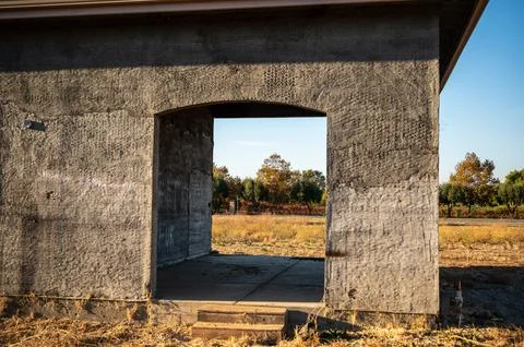An inviting architectural scene showcasing an old wooden door and blue-painte Stock Photos