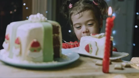 Inviting macro detail of child serving herself holiday cake Stock Footage 342140770