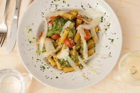 Inviting Pasta Dish with Wine Stock Photos