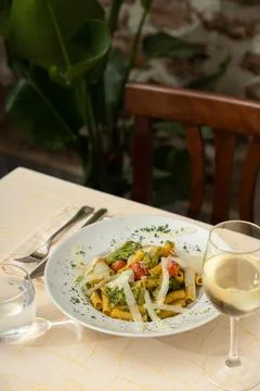 Inviting Pasta Dish with Wine.. Stock Photos