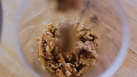 Inviting professional food view: grinding walnuts for satsivi sauce Stock Footage 342201458