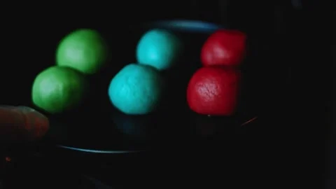 Inviting serving sequence of lifting colorful cookie rounds from the mold Stock Footage 342155677