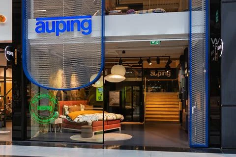 The inviting storefront of an Auping store, showcasing modern bedroom furnitu Stock Photos
