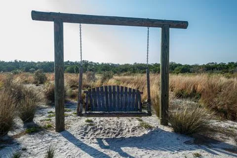 Inviting swing along the path Stock Photos