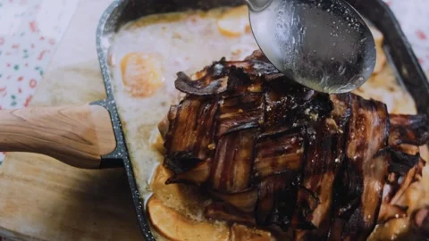 Inviting textured food: serving thick slices of bacon wrapped tenderloin Stock Footage 342186570