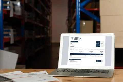 Invoice on computer screen from accounting application. Snugly. Stock Photos