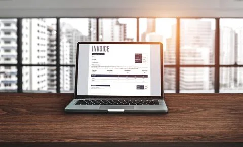 Invoice on computer screen from accounting application. Snugly. Stock Photos