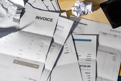 Invoice is crumpled on the table Stock Photos