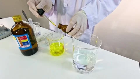 Iodine Clock Reaction Science Experiment in Laboratory Stock Footage 306812955