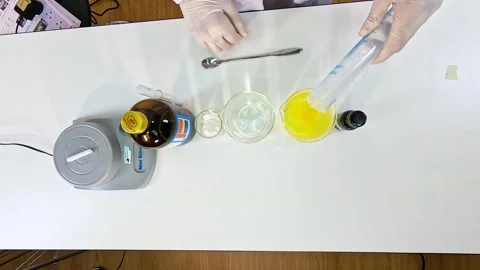 Iodine Clock Reaction Science Experiment in Lab Setting Stock Footage 307159025