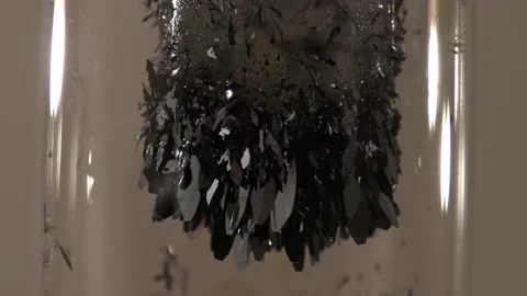 Iodine crystals close up spinning Stock Footage 142906885