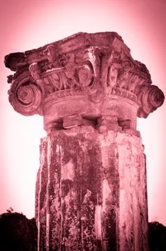 Ionic Column in burning sky of Pompeii Stock Photos