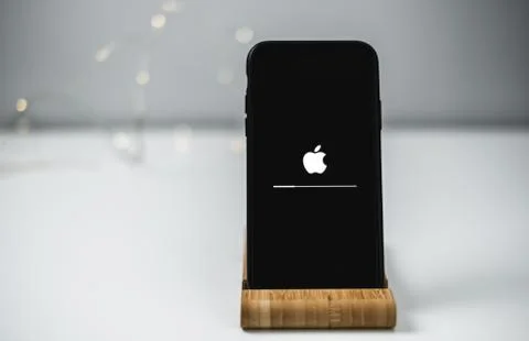 IOS firmware update on the iPhone screen. Stock Photos