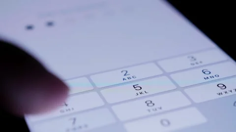 IOS Software Update on mobile phone, Close up shot. Finger touching display of Stock Footage 301877529