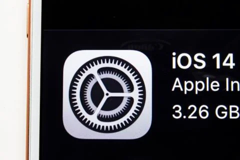The IOS14 software update on a black background. Stock Photos