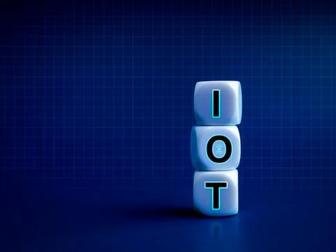 IOT, Internet of things concept. Acronym "IOT" on white block stacks on blu.. Foto stock