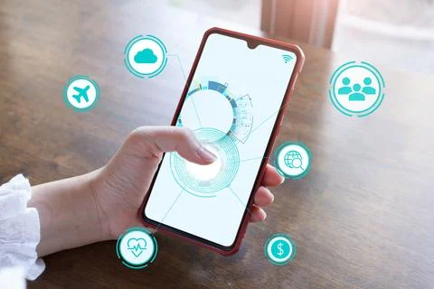 IoT Internet of Things development concept ,The hand touch screen smartphone  Stock Photos