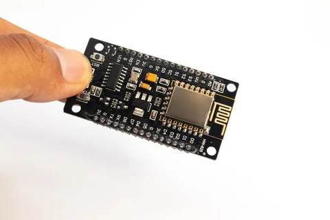 An IOT (Internet of Things) module held in hand. This module is used for elec Foto stock