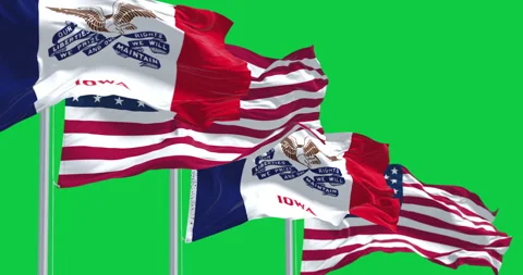 Iowa state flag waving in the wind with the US flag isolated on green backg.. Video stock 318828993