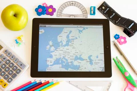 Ipad 3 with maps and school accesories Фото