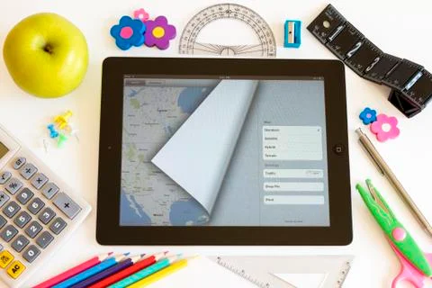 Ipad 3 with maps and school accesories 스톡 사진