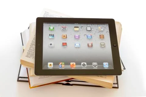 Ipad 3 on opened books Stock Photos