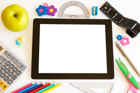 Ipad 3 white background with school accesories Фото