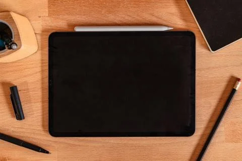 IPad and tools on a desk Foto stock