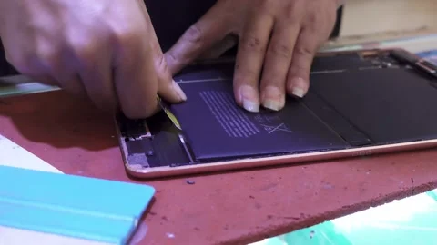 Ipad battery removal, 4K Stock Footage 315098549